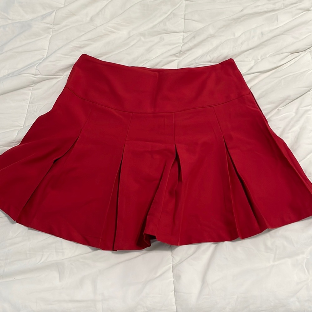 This bright red mini skirt is truly to die for. New and ready to find a home!